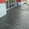 Heritage Fiat,
Reisterstown, Md.
B&G Concrete,llc
Stampcrete's Ashlar slate pattern; Dark gray integral, Charcoal release, 9000 sealer